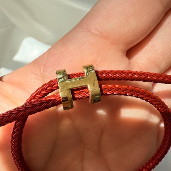 Adjustable wire bracket 
Red and Gold Braided Bracelet - Picture 5 of 10